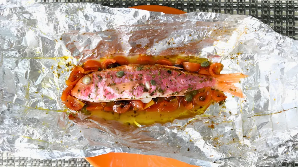 Salmonetes al horno en cartoccio receta tradicional italiana